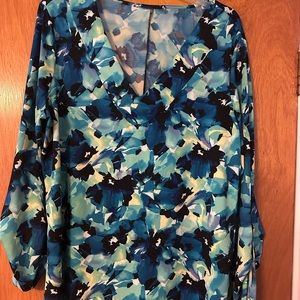 Blue floral shirt.